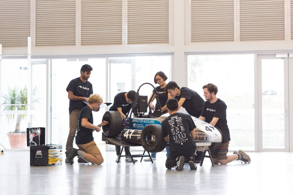 A group of students engineering a project in New Zealand University