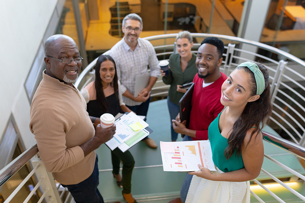 A group of university lecturers on a stairway