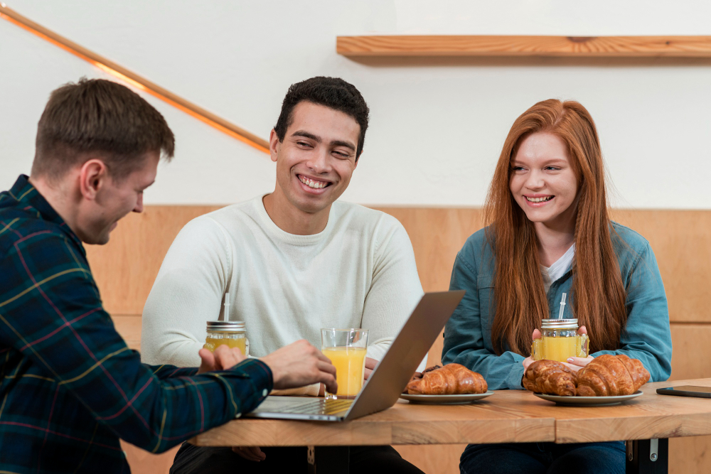 University students networking in a cafe while studying in Australia