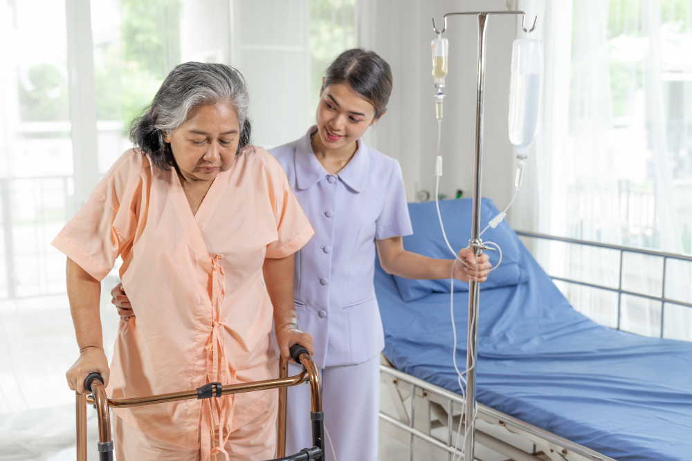 Nurse taking care of an elderly patient