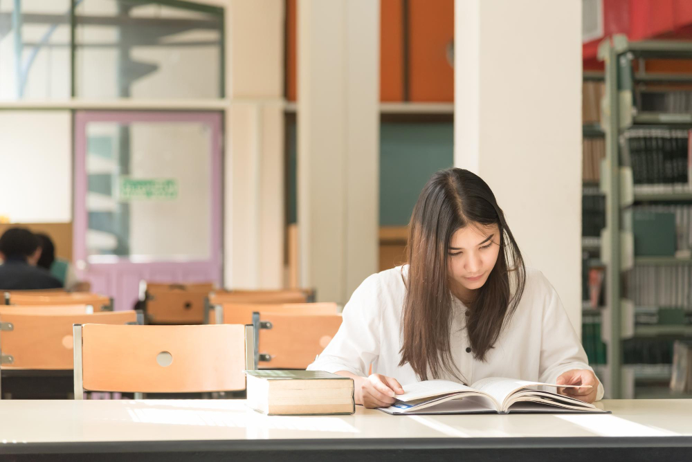 University Student studying in the Library