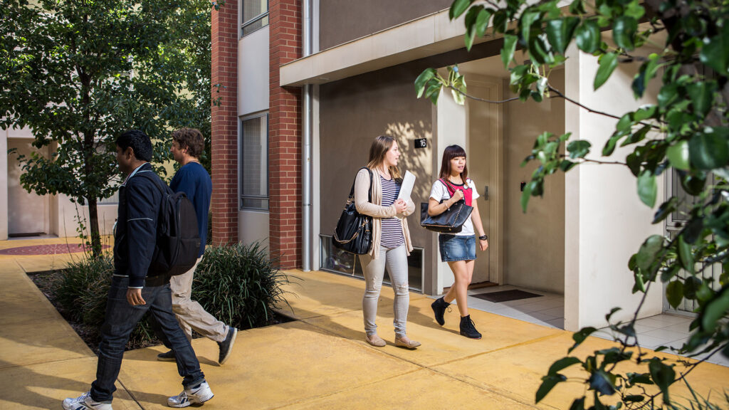 students walking near adelaide university accommodation