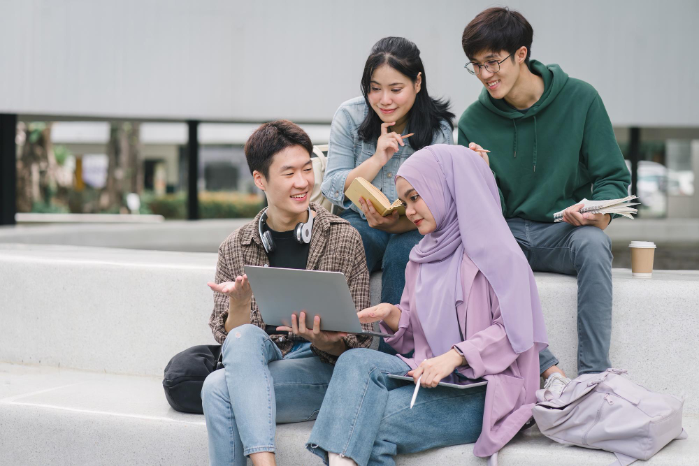 Malaysian university students having a discussion on campus