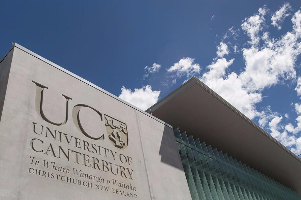 University of Canterbury signage carved into the concrete entrance wall at the Christchurch campus