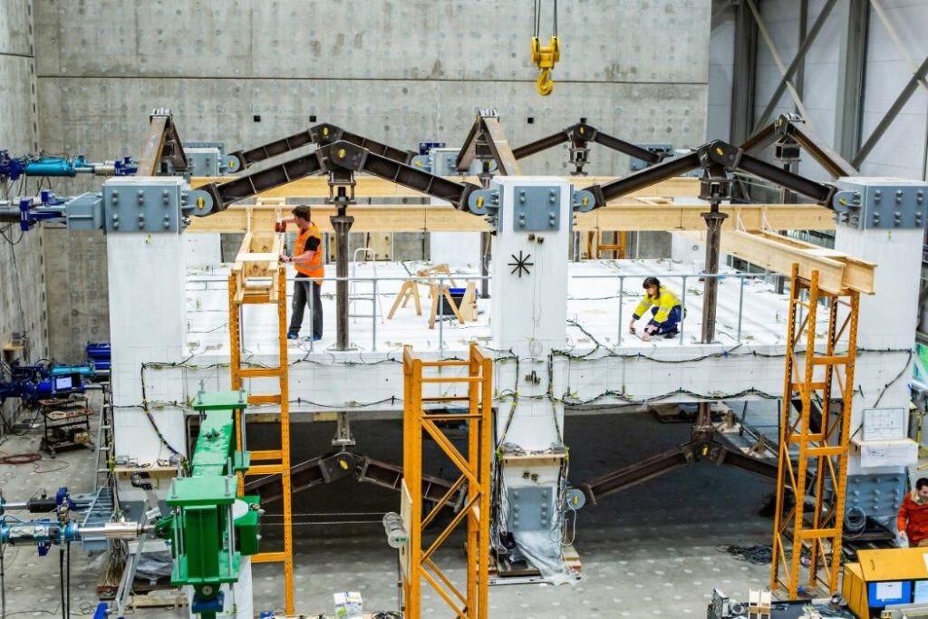 University of Canterbury engineering students doing hands-on construction work as part of their bachelor of engineering course